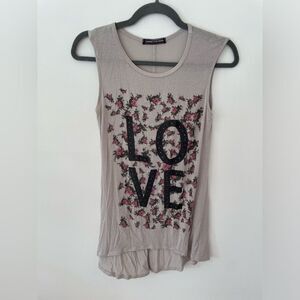 Happening in the present tank top. Size small